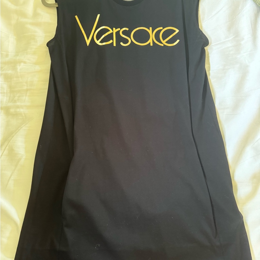 Versace tunic with pockets and gold buttons